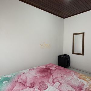 Casa com 136m², 3 dormitórios, 1 suíte, 2 vagas no bairro Praia da Cal em Torres para Comprar