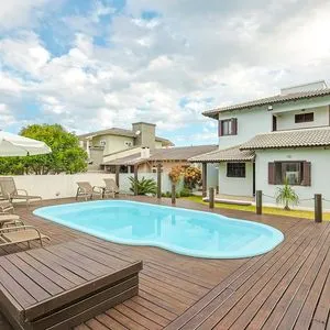 Casa, 4 dormitórios, 1 suíte, 2 vagas no bairro Itapeva Norte em Torres para Comprar