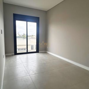 Casa com 140m², 3 dormitórios, 1 suíte, 2 vagas no bairro Morada das Palmeiras em Torres para Comprar