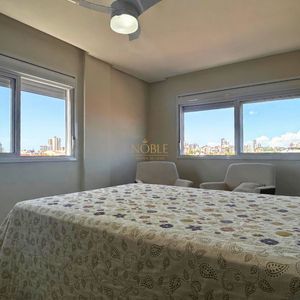 Apartamento com 60m², 2 dormitórios, 1 suíte, 1 vaga no Residencial Morada do Sol em Torres para Comprar