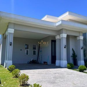 Casa de Condomínio com 226m², 3 dormitórios, 3 suítes, 2 vagas no Reserva das Águas em Torres para Comprar