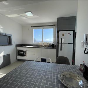 Apartamento com 70m², 2 dormitórios, 1 suíte, 1 vaga no Monet em Torres para Comprar