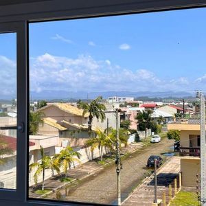 Apartamento com 72m², 2 dormitórios, 1 suíte, 1 vaga no Topazio em Torres para Comprar
