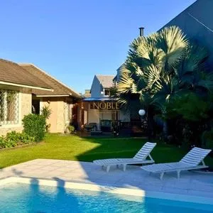Casa com 243m², 4 dormitórios, 1 suíte, 2 vagas no bairro Stan em Torres para Comprar
