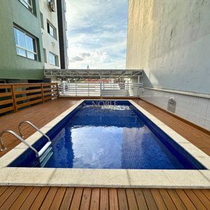 Apartamento com 73m², 2 dormitórios, 1 suíte, 1 vaga no Torre de Athena em Torres para Comprar