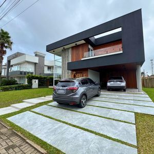 Casa de Condomínio com 435m², 4 dormitórios, 4 suítes, 4 vagas no Ocean Side em Torres para Comprar