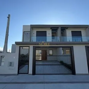 Geminado com 141m², 3 dormitórios, 1 suíte, 2 vagas no bairro Morada das Palmeiras em Torres para Comprar