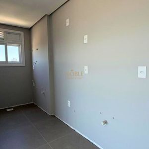 Apartamento com 70m², 2 dormitórios, 1 suíte, 1 vaga no Topazio em Torres para Comprar