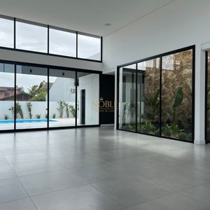 Casa com 288m², 4 dormitórios, 4 suítes, 4 vagas no bairro Bella Torres em Passo de Torres para Comprar