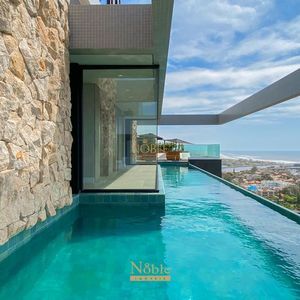 Apartamento com 140m², 3 dormitórios, 3 suítes, 2 vagas no Voga em Torres para Comprar