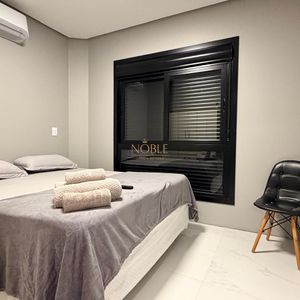 Casa, 2 dormitórios, 2 suítes, 1 vaga no bairro Morada das Palmeiras em Torres para Comprar