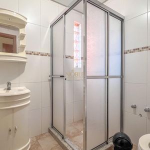 Apartamento com 100m², 2 dormitórios, 1 suíte, 1 vaga no Cayman em Torres para Comprar