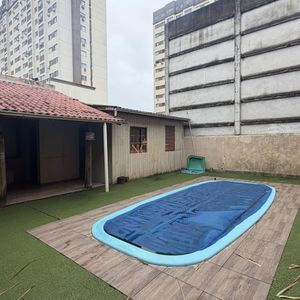 Casa, 3 dormitórios, 1 suíte, 2 vagas no bairro Igra Sul em Torres para Comprar