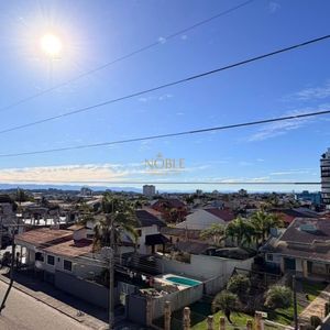 Apartamento com 83m², 2 dormitórios, 1 suíte, 2 vagas no Bellagio Residenziale em Torres para Comprar