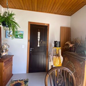 Casa com 135m², 3 dormitórios, 1 suíte, 1 vaga no bairro Bela Vista em Passo de Torres para Comprar