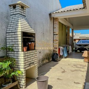 Casa, 2 dormitórios, 2 vagas no bairro Igra Norte em Torres para Comprar