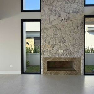 Casa com 335m², 4 dormitórios, 4 suítes, 2 vagas no Reserva das Águas em Torres para Comprar