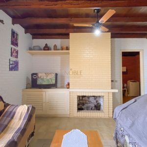 Casa com 152m², 3 dormitórios, 1 suíte, 4 vagas no bairro Praia da Cal em Torres para Comprar