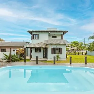 Casa, 4 dormitórios, 1 suíte, 2 vagas no bairro Itapeva Norte em Torres para Comprar