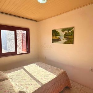 Casa, 6 dormitórios, 2 vagas no bairro Praia da Cal em Torres para Comprar