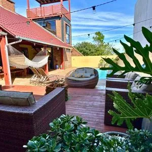 Casa com 108m², 2 dormitórios, 2 vagas no bairro Capão do Cravo em Passo de Torres para Comprar