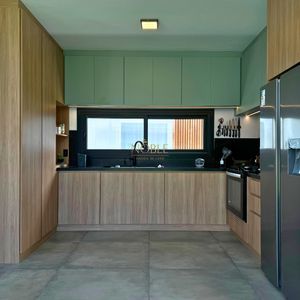 Casa de Condomínio com 350m², 3 dormitórios, 3 suítes, 2 vagas no Condomínio Ilhas Park em Torres para Comprar