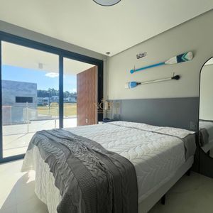 Casa de Condomínio com 240m², 4 dormitórios, 4 suítes, 2 vagas no Reserva das Águas em Torres para Comprar