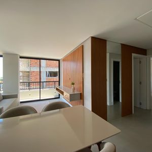 Apartamento com 60m², 2 dormitórios, 1 suíte, 1 vaga no Aston em Torres para Comprar