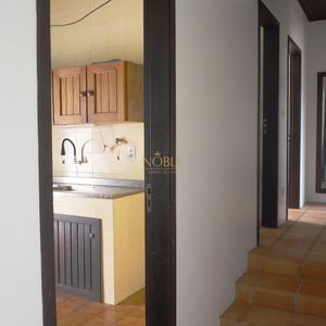 Casa com 260m², 5 dormitórios, 1 suíte, 2 vagas no bairro Praia Grande em Torres para Comprar