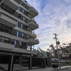 Apartamento com 60m², 2 dormitórios, 1 suíte, 1 vaga no Aston em Torres para Comprar