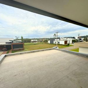 Casa de Condomínio com 306m², 4 dormitórios, 4 suítes, 4 vagas no Reserva das Águas em Torres para Comprar