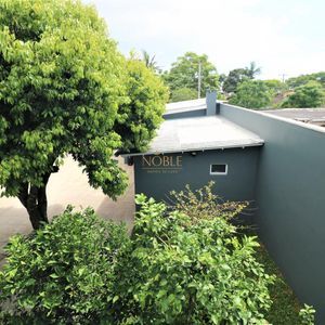 Sobrado com 220m², 5 dormitórios, 4 suítes, 3 vagas no bairro Stan em Torres para Comprar