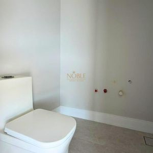 Casa com 335m², 4 dormitórios, 4 suítes, 2 vagas no Reserva das Águas em Torres para Comprar