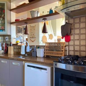 Apartamento com 102m², 2 dormitórios, 1 suíte, 1 vaga no La Tour em Torres para Comprar