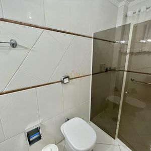 Casa com 500m², 7 dormitórios, 2 suítes, 2 vagas no bairro Centro em Torres para Comprar