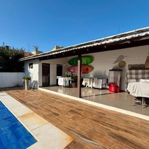 Casa, 3 dormitórios, 1 suíte, 2 vagas no bairro Praia Grande em Torres para Comprar