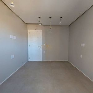 Apartamento com 114m², 3 dormitórios, 1 suíte, 2 vagas no Titanium em Torres para Comprar