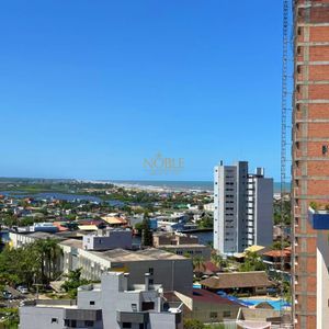 Apartamento com 91m², 2 dormitórios, 2 suítes, 2 vagas no Toronto em Torres para Comprar