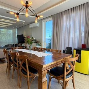 Casa com 210m², 3 dormitórios, 1 suíte, 2 vagas no bairro Novo Passo em Passo de Torres para Comprar