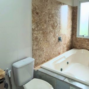 Sobrado com 127m², 3 dormitórios, 1 suíte, 1 vaga no Ilhas Travertino em Torres para Comprar