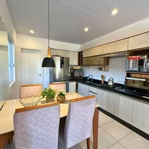 Casa com 108m², 2 dormitórios, 2 vagas no bairro Capão do Cravo em Passo de Torres para Comprar