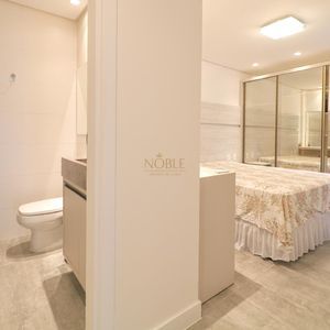 Apartamento com 128m², 3 dormitórios, 1 suíte, 2 vagas no Casa Carmel em Torres para Comprar