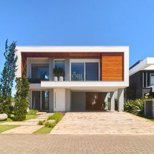 Casa de Condomínio com 260m², 4 dormitórios, 4 suítes, 2 vagas no Reserva das Águas em Torres para Comprar