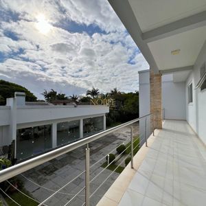 Casa com 600m², 4 dormitórios, 1 suíte, 4 vagas no bairro Igra Norte em Torres para Comprar