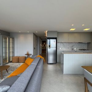 Apartamento com 102m², 3 dormitórios, 1 suíte, 2 vagas no Maui Residencial em Torres para Comprar