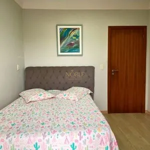 Casa com 272m², 4 dormitórios, 1 suíte, 3 vagas no bairro Igra Norte em Torres para Comprar