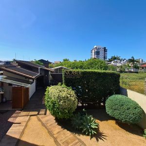 Casa, 3 dormitórios, 1 suíte, 2 vagas no bairro Stan em Torres para Comprar