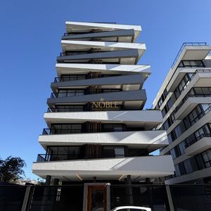 Apartamento com 51m², 2 dormitórios, 1 vaga no Majestic Residencial em Torres para Comprar