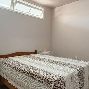 Casa com 171m², 4 dormitórios, 3 vagas no bairro Porto Alegre em Torres para Comprar