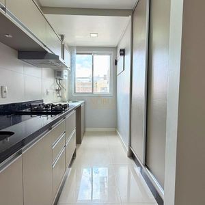 Apartamento com 110m², 3 dormitórios, 1 suíte, 2 vagas no Praia Bávaro em Torres para Comprar